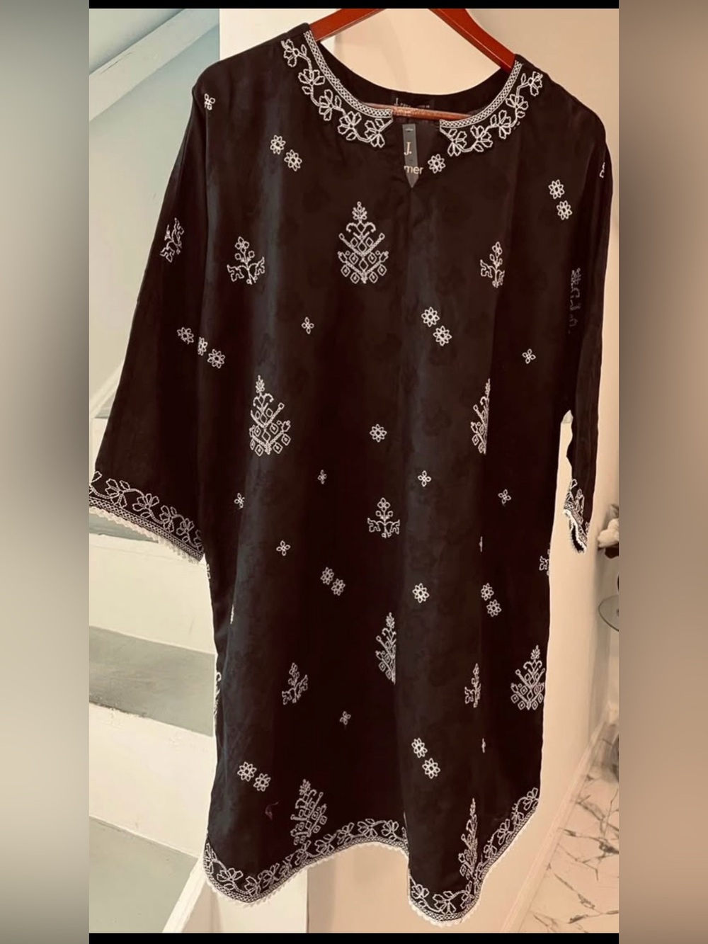Pakistani black embroidered shirt.